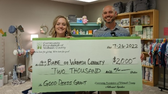 Pictured: Sam McFadden of the Community Foundation presents the Good Deeds Grant check to Katey Till, Founder and Executive Director of Babe of Wabash County